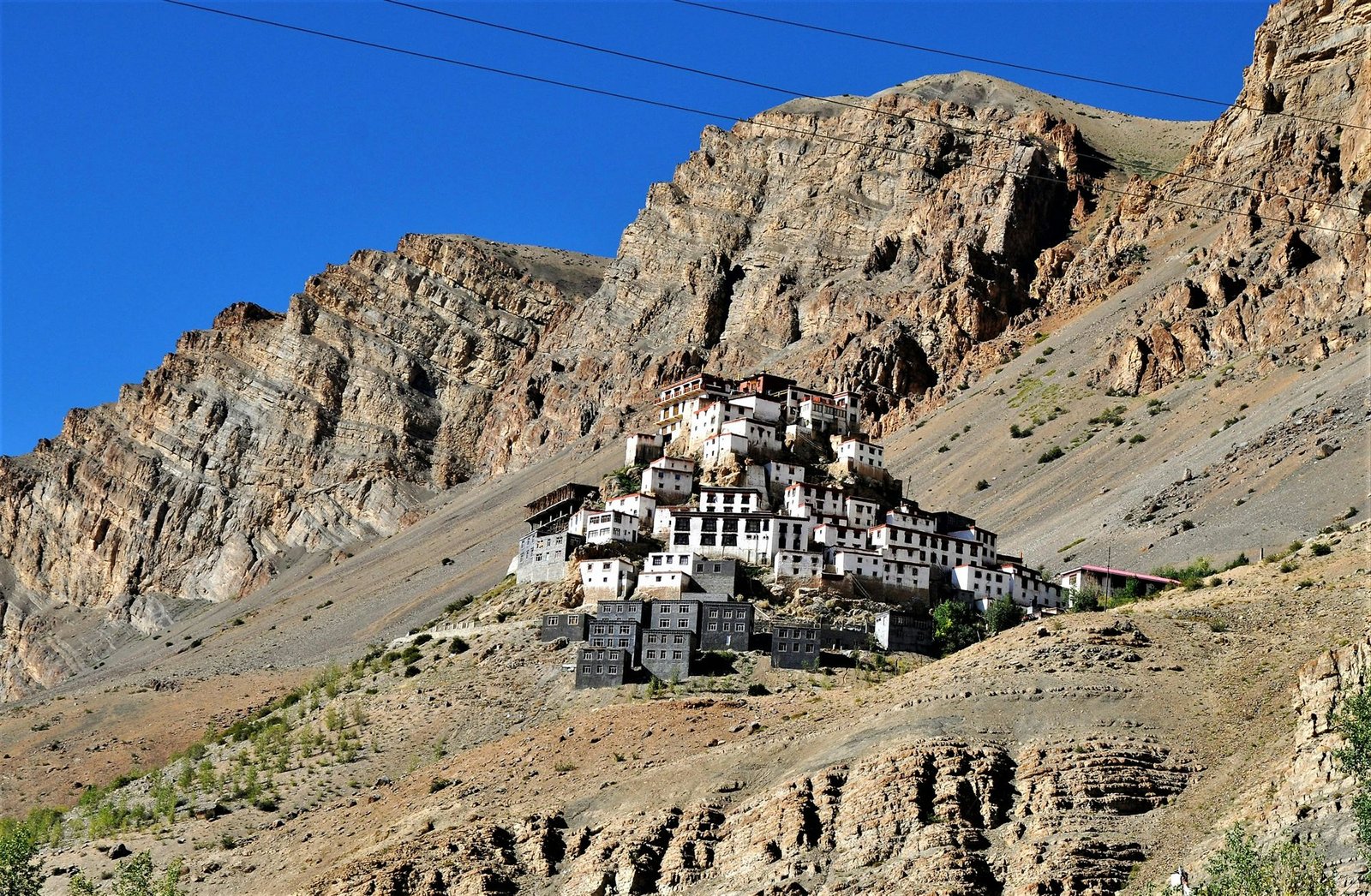 Mountain highway cutting through the high-altitude moonscape of Spiti Valley