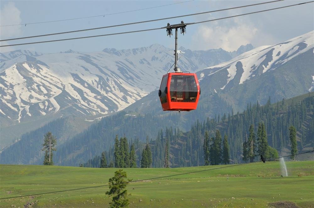 Gulmarg Gondola cable car above alpine meadows